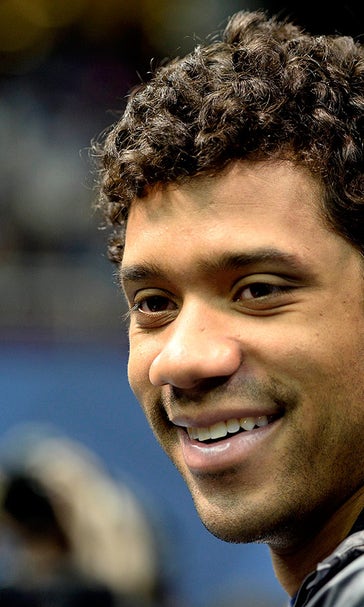 Minor league baseball team offers Russell Wilson 10K to play in game